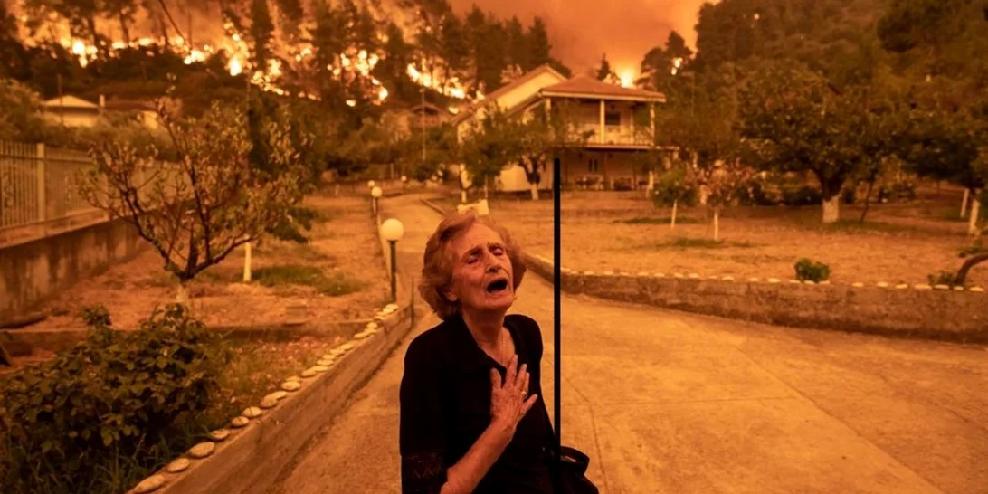Η σπαρακτική φωτογραφία από τις πυρκαγιές στην Εύβοια ανάμεσα στις 100 καλύτερες φωτογραφίες του περιοδικού TIME για το 2021