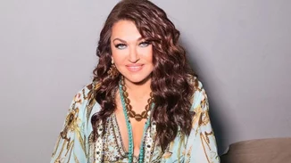 Καλοκαίρι 2007 | Η Καίτη Γαρμπή αγκαλιά με τον Διονύση Σχοινά και τον γιο τους, Δημήτρη, σε μία υπέροχη φωτογραφία