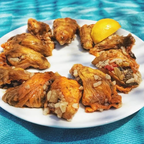 Κολοκυθοανθοί γεμιστοί με ρύζι και σταφίδες