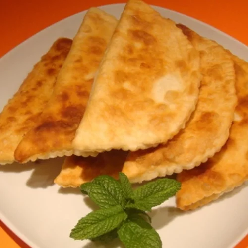 Συνταγή για αφράτα πισία με τυρί ή αλλιώς τηγανιτές τυρόπιτες