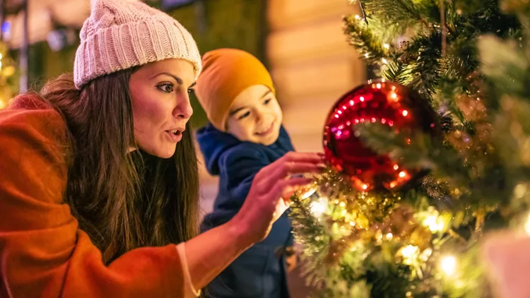 Mother and son enjoying Christmas in the city
