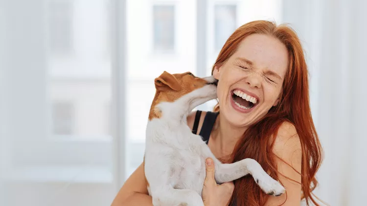 puppy and woman