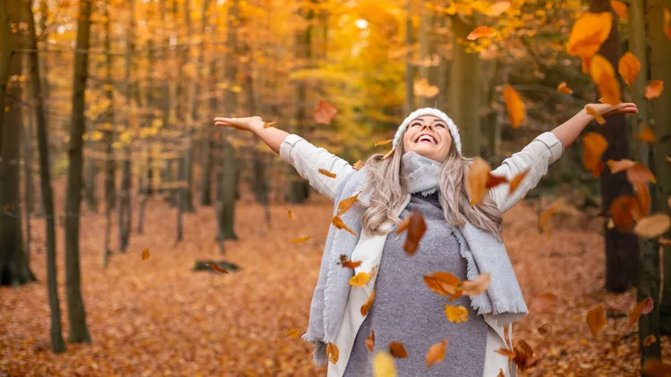 Young woman enjoying autumn