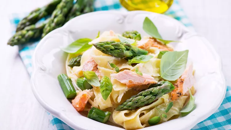 Pappardelle pasta with salmon and green asparagus