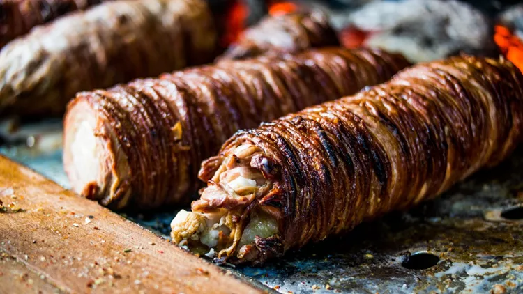 Turkish Street Food Kokorec made with sheep bowel cooked in wood fired oven.