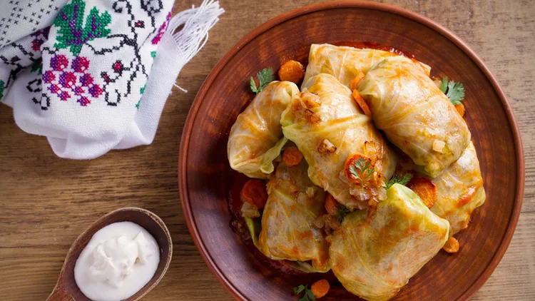 Stuffed cabbage leaves with meat, rice and vegetables. Chou farci, dolma, sarma, sarmale, golubtsy or golabki