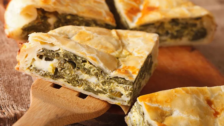 Greek pie with spinach and cheese spanakopita close-up. horizontal