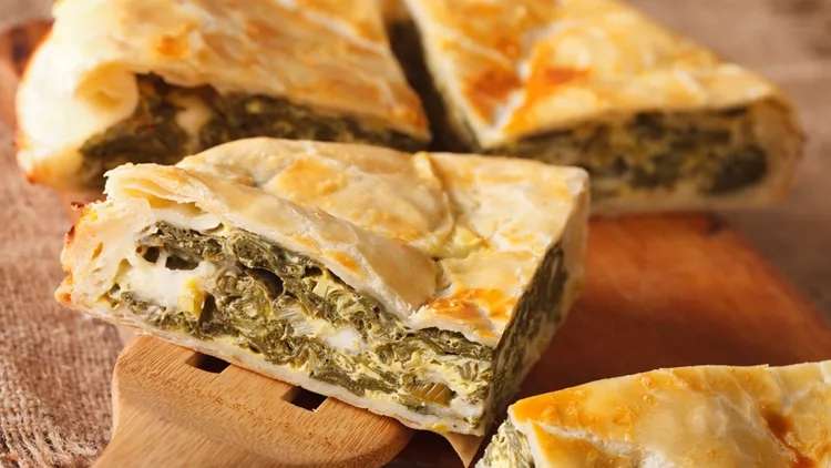 Greek pie with spinach and cheese spanakopita close-up. horizontal