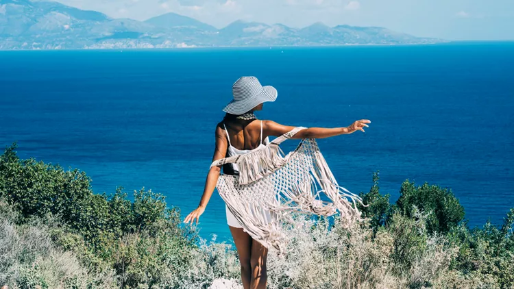 Rear view of woman looking at sea