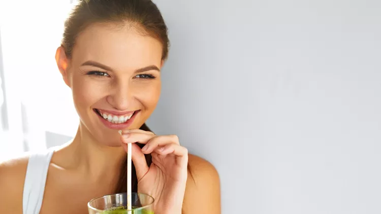 Healthy Food Eating. Woman Drinking Smoothie. Diet. Lifestyle. Nutrition