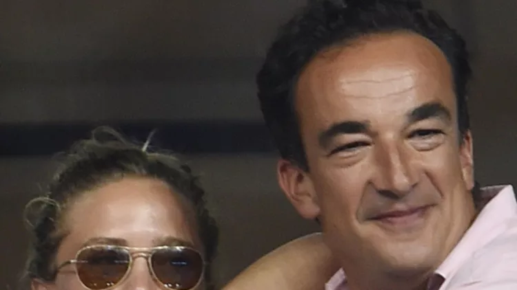 Olivier Sarkozy and Mary-Kate Olsen seen on day eight of the 2014 US Open