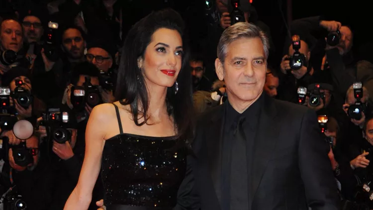 George Clooney and wife Amal Clooney attend the 'Hail, Caesar!' premiere during the 66th Berlinale International Film Festival Berlin at Berlinale Palace on February 11, 2016 in Berlin, Germany.