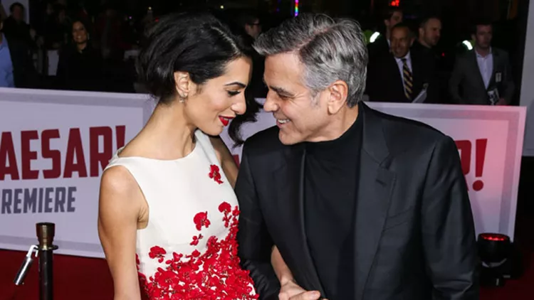 George Clooney and wife Amal Clooney arrive at the Los Angeles Premiere Of Universal Pictures' 'Hail, Caesar!'
