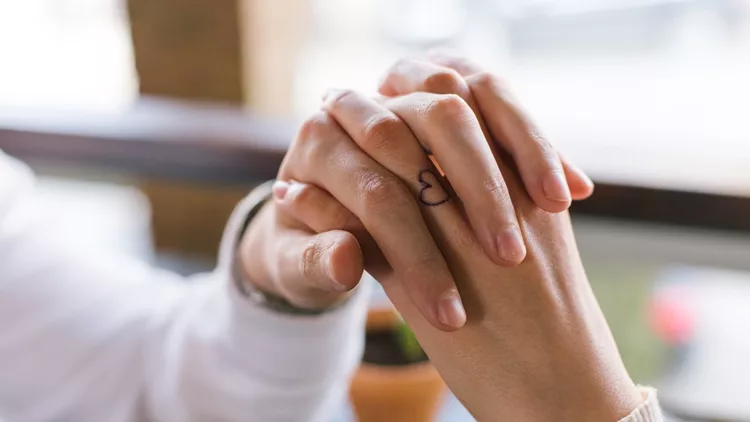 couple holding hands