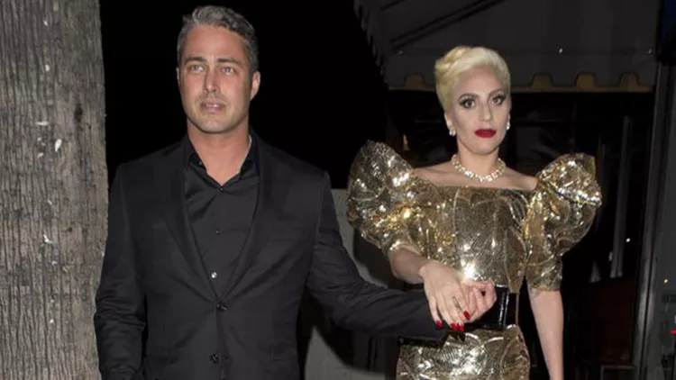 Lady Gaga and her fiancé Taylor Kinney were seen walking two full blocks to 'No Name ' Restaurant to celebrate Gaga's birthday party in Los Angeles, CA