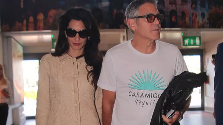 George and Amal Clooney leaving their hotel in Rome and arriving at the airport of Ciampino