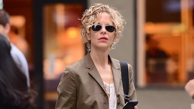 Meg Ryan wears bell bottom jeans in SoHo