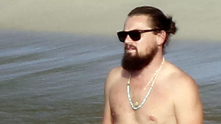 ** NO ITALY ** Leonardo DiCaprio partying with a bevy of bikini-clad beauties In St. Barth on NYE