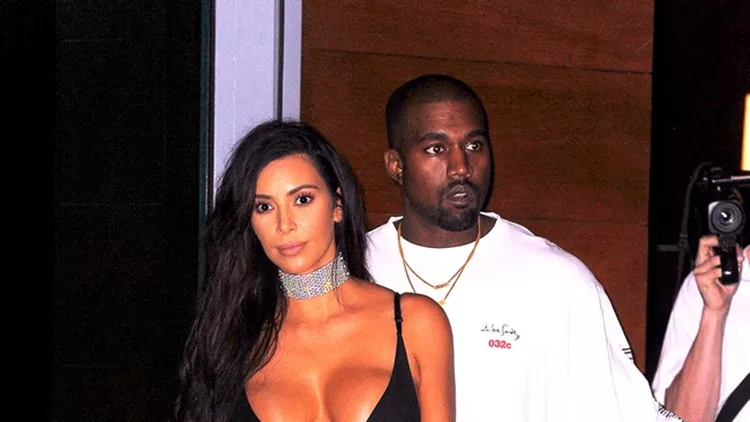 Kim Kardashian looks stunning in a curvy lingerie dress as she heads out with Kanye West in Miami