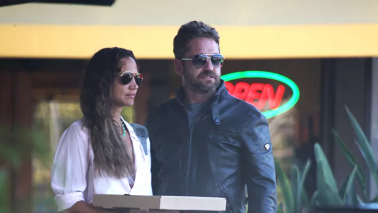 Gerard Butler &amp; Morgan Brown on motorcycle in Malibu