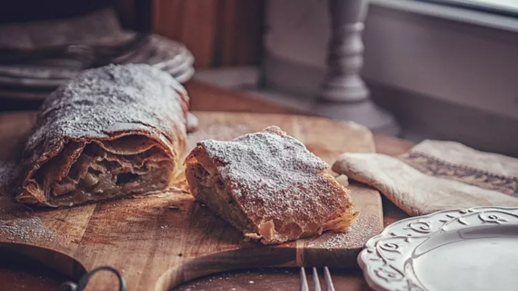 homemade-apfelstrudel-with-powdered-sugar-picture-id908545484