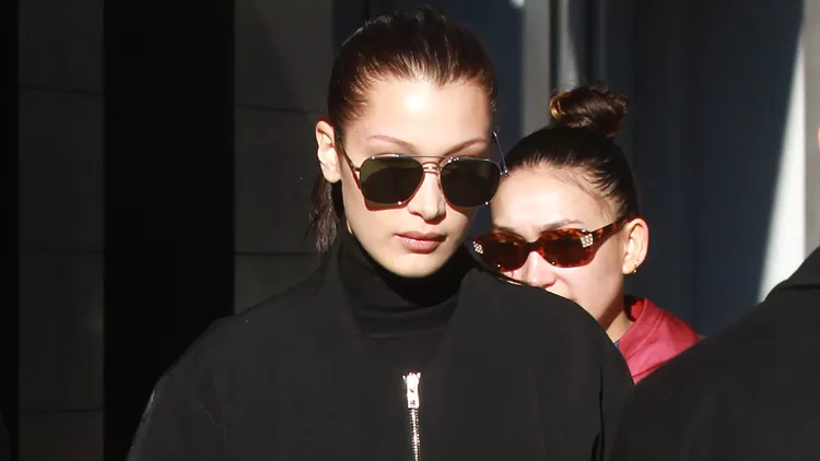Bella Hadid wears an all black outfit while leaving her apartment in New York City