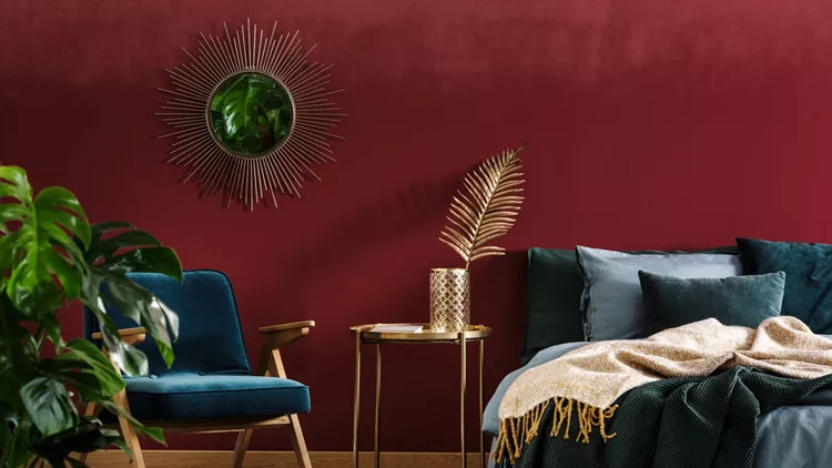 Sophisticated red bedroom with mirror