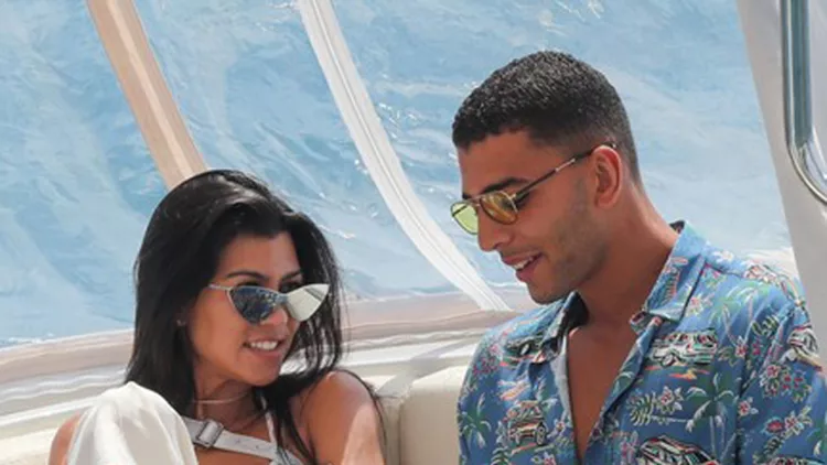 Kourtney Kardashian and her new man Younes Bendjima leaving Eden Roc by Boat
