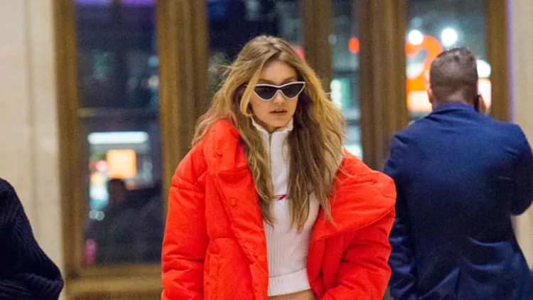Gigi Hadid stuns in a red puffer jacket while leaving Nobu Restaurant in New York City