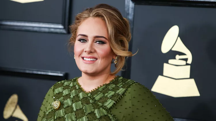 Adele wearing custom Givenchy Haute Couture by Riccardo Tisci and Lorraine Schwartz jewels attends the 59th Annual GRAMMY Awards