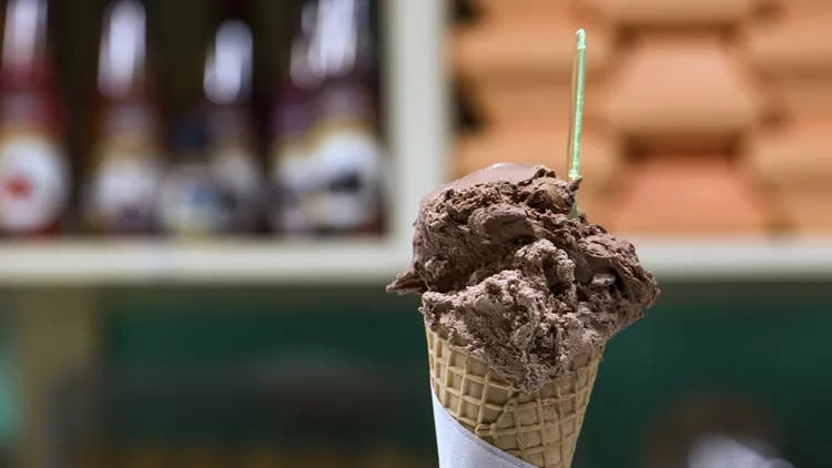 Chocolate ice-cream gelato in waffle cone