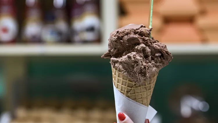Chocolate ice-cream gelato in waffle cone