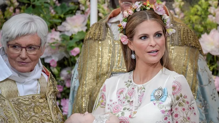Princess Madeleine and officiant Archbishop Antje Jackelen are seen during  princess Adrienne's christening ceremony in Drottningholm Palace Chapel, Stockholm