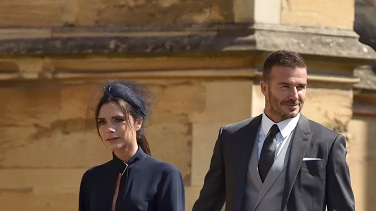 David and Victoria Beckham attend the wedding ceremony - Windsor
