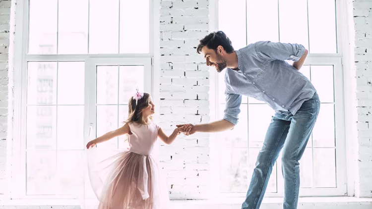 Dad with daughter at home