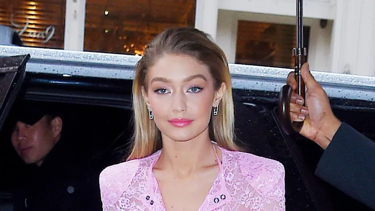 Gigi Hadid out in a see through pink ensemble in NYC