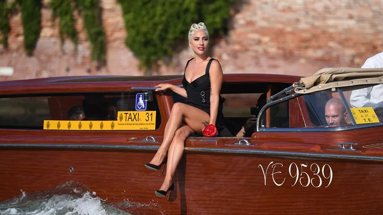 Lady Gaga spotted on a taxi boat in Venice