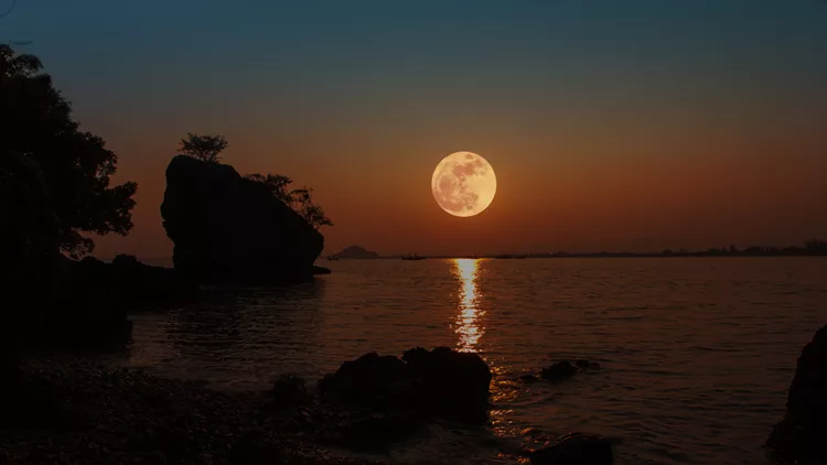 Full moon with reflection