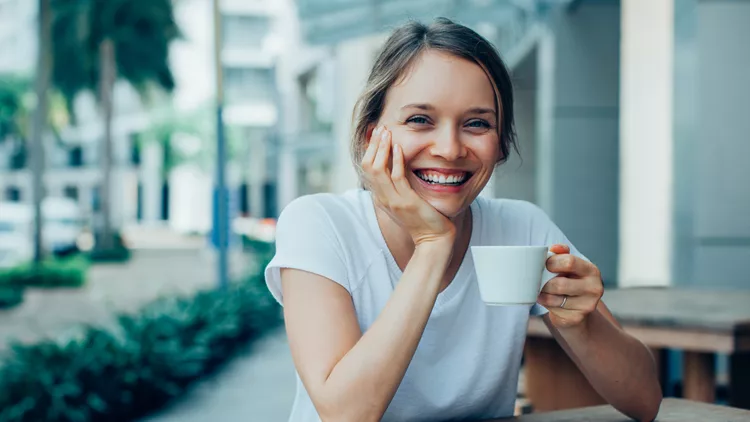 Happy Nice Lady Drinking Coffee in Outdoor Cafe