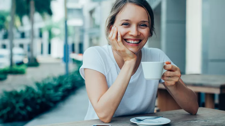 Happy Nice Lady Drinking Coffee in Outdoor Cafe