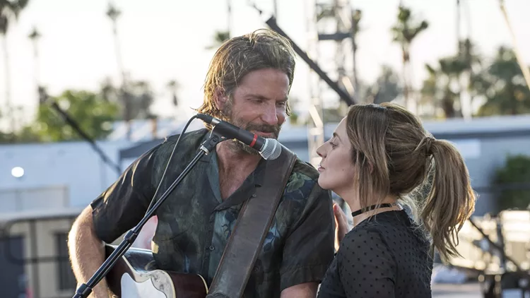 Lady Gaga and Bradley Cooper star in the musical drama "A Star is Born"