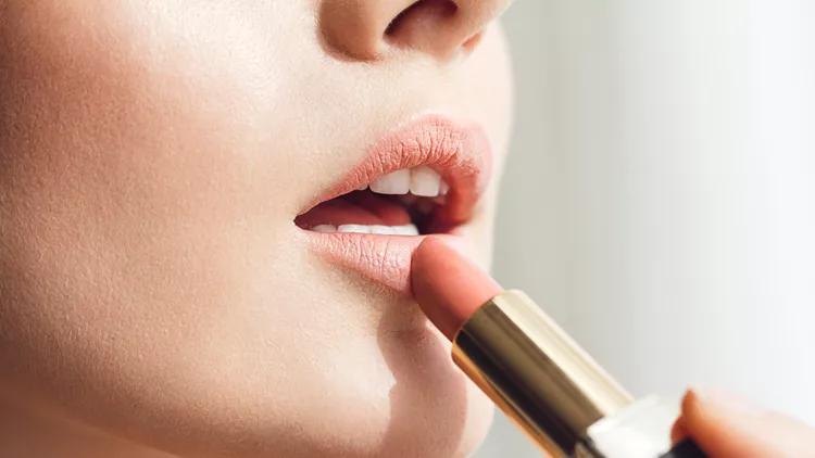 Beauty photo of applying lipstick