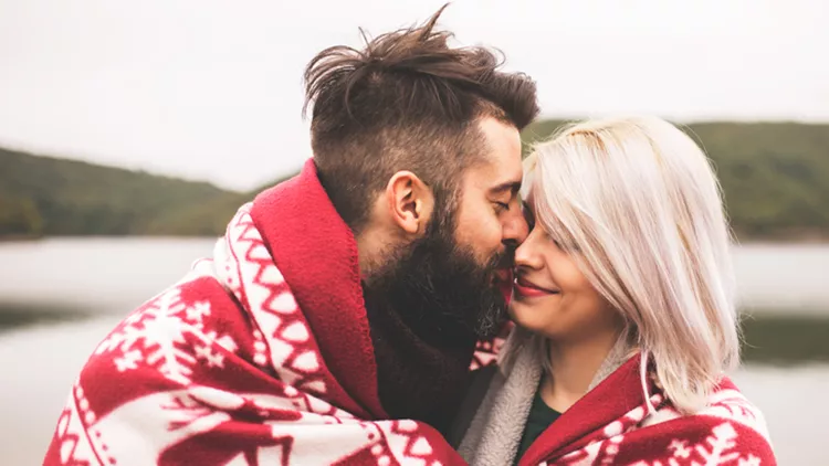 Couple outside under the blanket