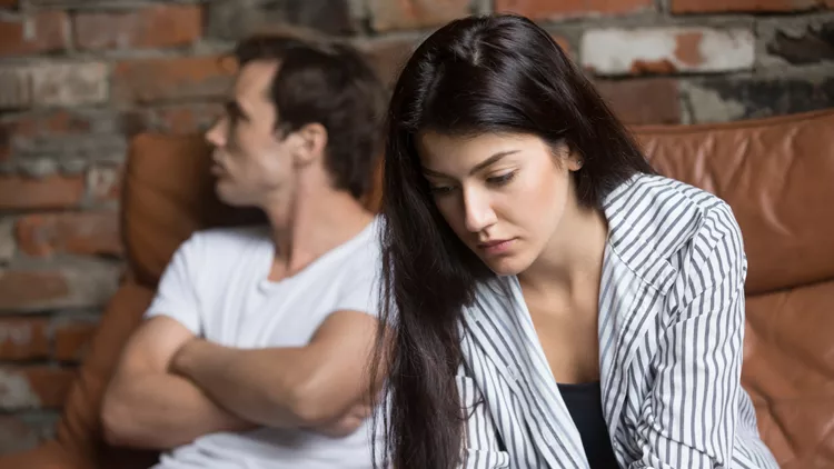 Sad pensive young girl thinking of relationships problems after fight