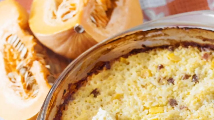 Baked milky cereal porridge with pumpkin and raisins