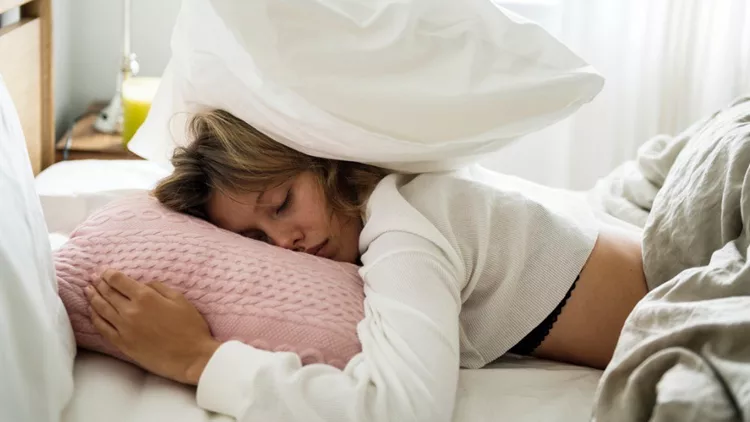 caucasian-woman-sleeping-on-her-bed-picture-id893227850