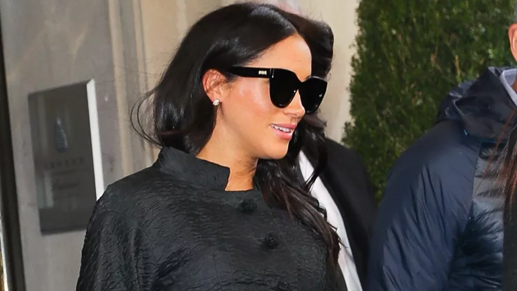 Meghan Markle The Duchess Of Sussex Holds Her Baby Bump While Leaving Her Baby Shower In New York City