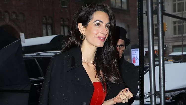 Amal Clooney Looks Radiant In A Red Jumpsuit While Returning Back At Her Hotel, After Attending Meghan Markles Baby Shower In NYC