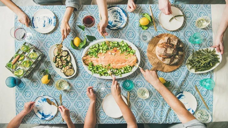family-or-friends-having-seafood-summer-dinner-picture-id973075368