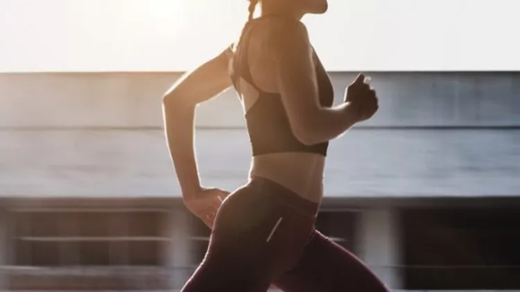 female-athlete-running-outdoors-picture-id611087822-600x600